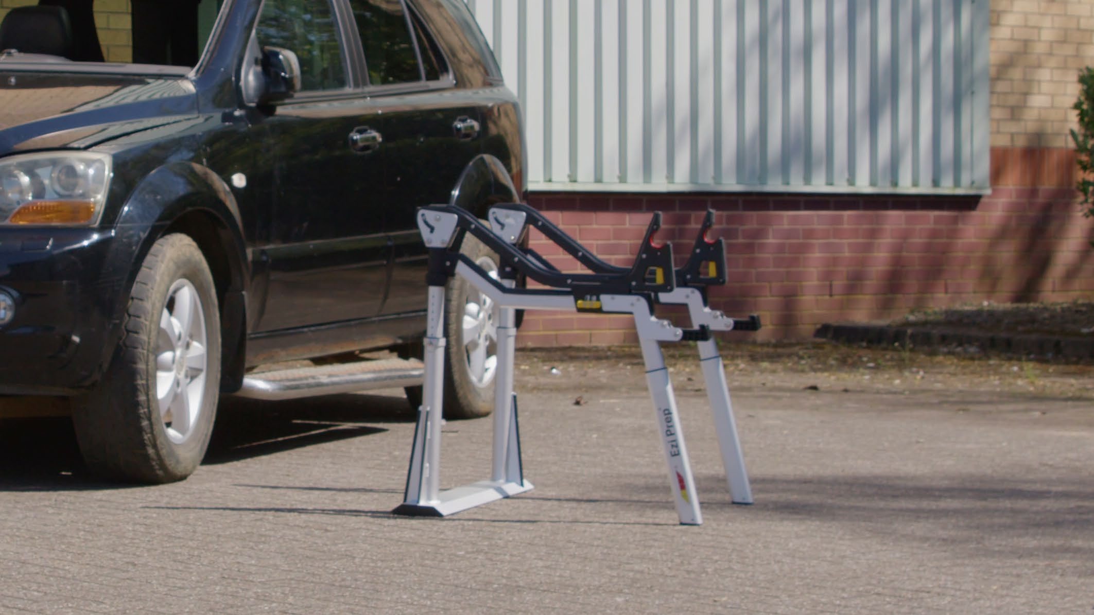 Ezi-Prep preparation table beside a vehicle during windscreen replacement
