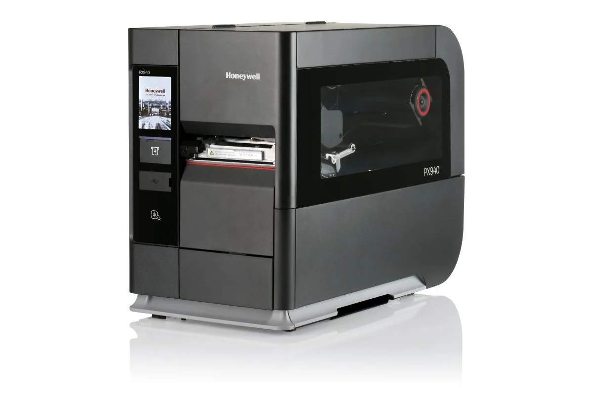 Three-quarter view of the Honeywell PX940 showing its front display and transparent media cover